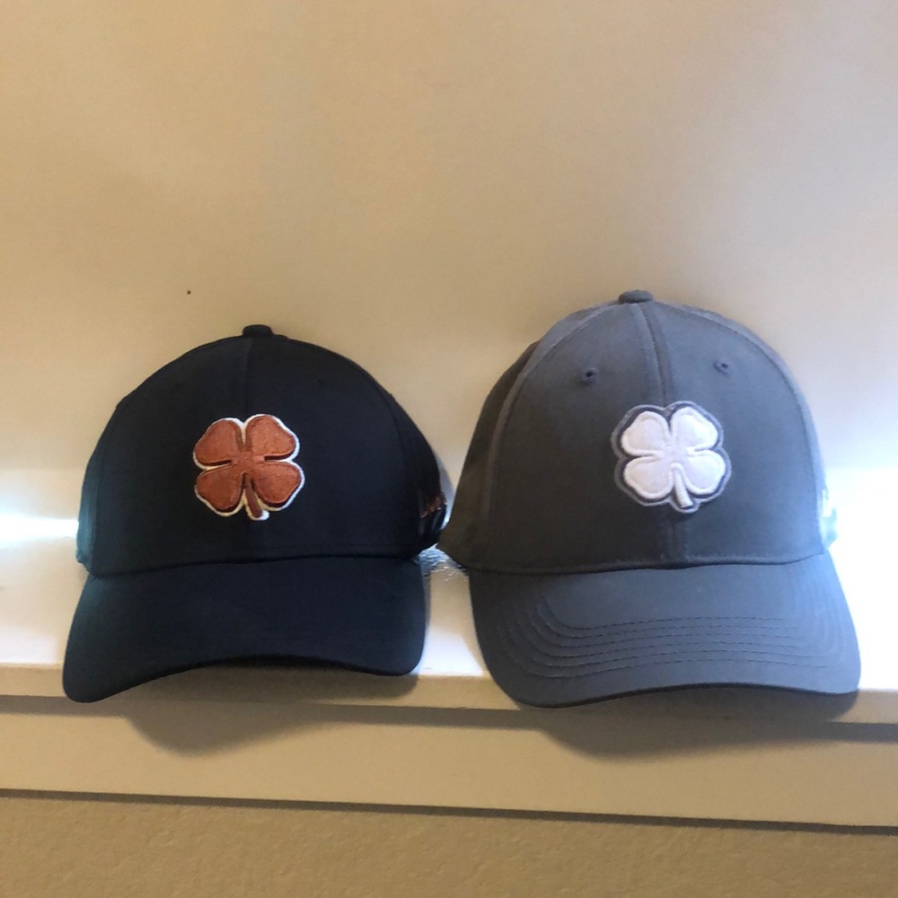 2 Like New Live Lucky Fitted Hats.  1 Black/Copper 1 Gray/White.  Both size S/M.